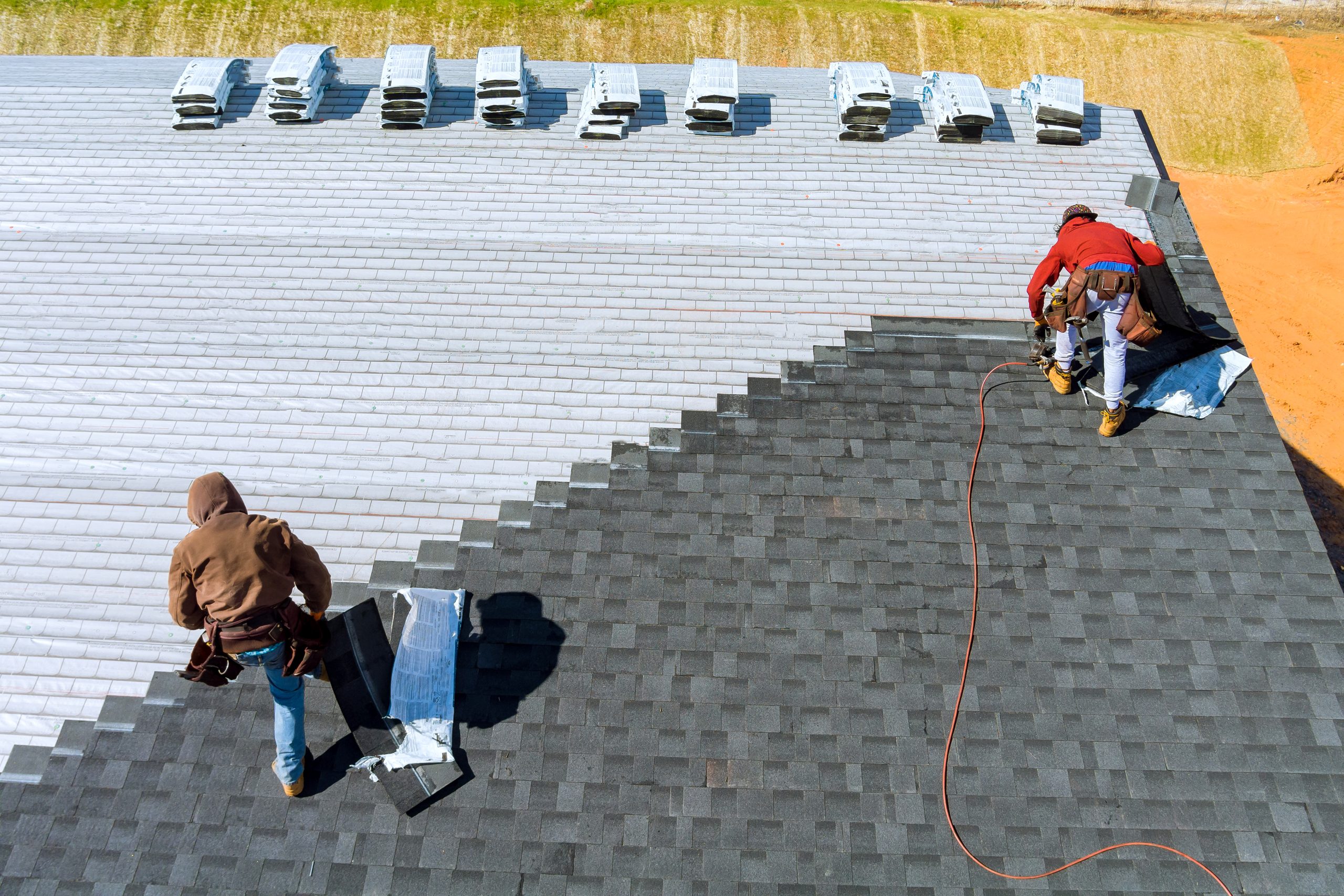 Two Person Replacing the roof